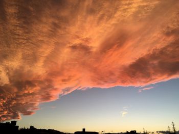 Scenic view of dramatic sky during sunset