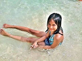 Young woman in water