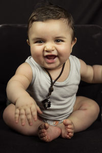 Portrait of cute baby boy at home