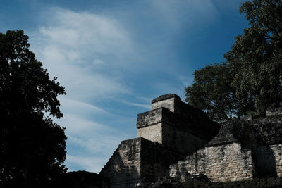 Low angle view of old building against sky
