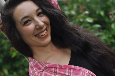 Close-up portrait of smiling woman