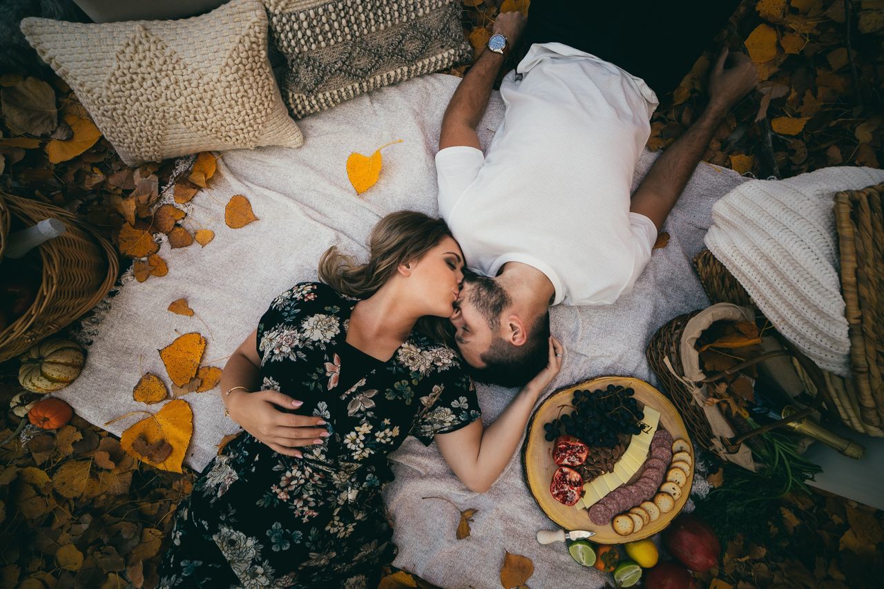 high angle view, two people, bed, real people, lying down, indoors, home interior, togetherness, lying on back, young women, love, young adult, relaxation, pillow, bedroom, lifestyles, bonding, stuffed toy, women, day, freshness, people