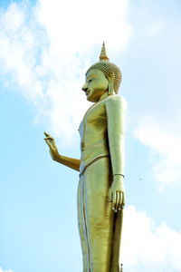 Low angle view of statue against sky