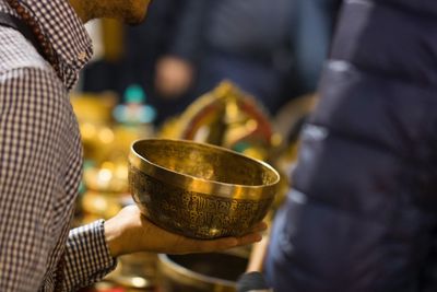 Close-up of hand holding tea