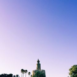 Low angle view of built structure against clear blue sky