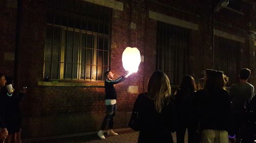 Group of people in the dark