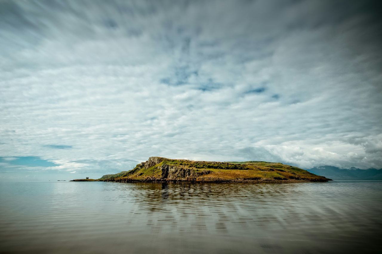 water, sky, sea, cloud - sky, cloudy, tranquility, tranquil scene, waterfront, scenics, nature, horizon over water, beauty in nature, cloud, built structure, outdoors, day, lake, idyllic, overcast, no people