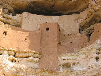 Rock formation in front of built structure