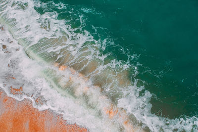 High angle view of surf at beach