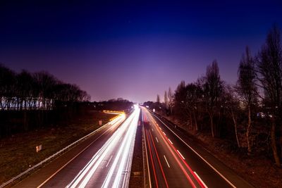 Light trails on road at night