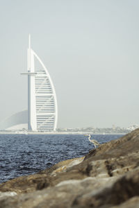 View of beach against clear sky