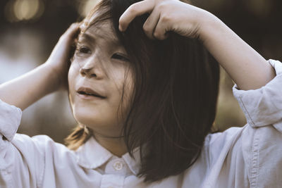 Close-up of girl looking away