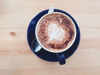 Close-up of cappuccino on table