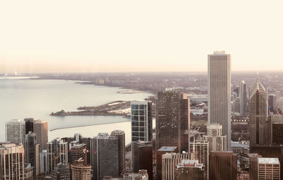 Modern buildings in city against sky