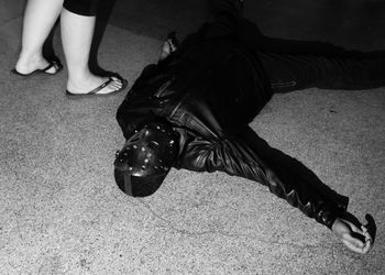 Low section of men sitting outdoors