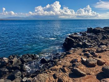 Scenic view of sea against blue sky