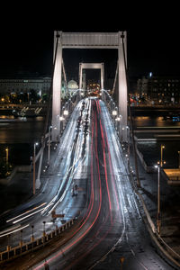 High angle view of light trails on road