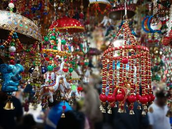 Close-up of christmas decorations hanging in market