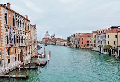 Canal passing through city buildings