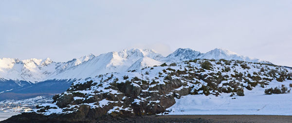 Scenic view of snowcapped mountains against sky