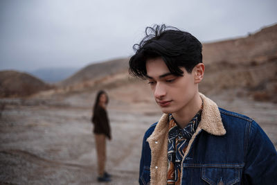 Portrait of young man looking at camera