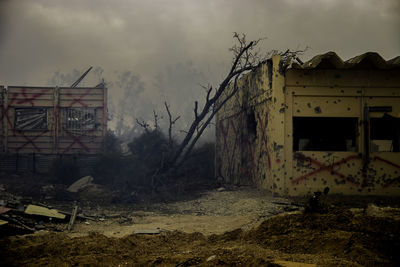 Abandoned house against sky