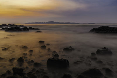 Scenic view of sea against sky during sunset