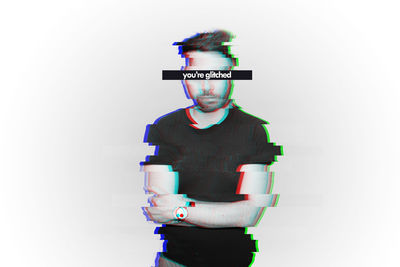 Digital composite image of man standing against white background
