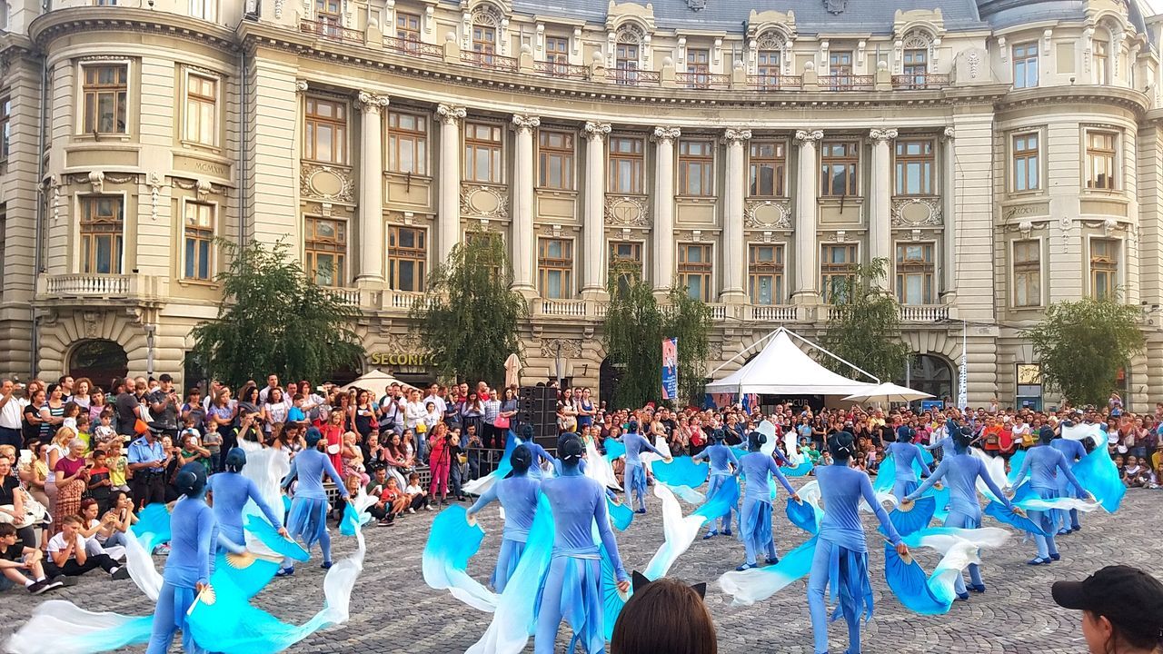 crowd, architecture, large group of people, group of people, building exterior, built structure, city, men, celebration, women, nature, person, adult, event, government, day, street, arts culture and entertainment, outdoors, travel destinations, lifestyles