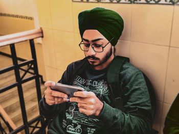 Young man using mobile phone