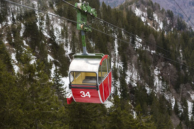 Red gondola at kampenwand in bavaria, germany, wintertime