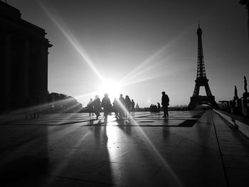 People walking in front of building