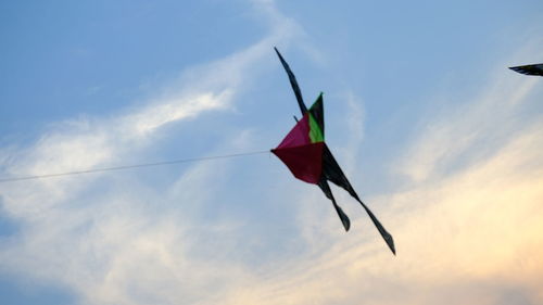 Low angle view of flag against sky