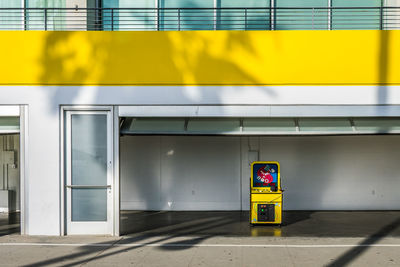 Information sign on yellow wall