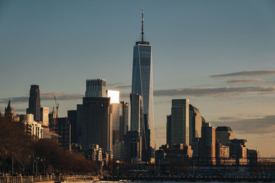 Modern buildings in city against sky