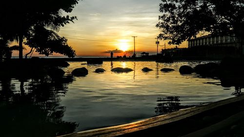 Scenic view of sunset over river