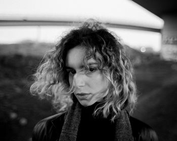 Portrait of young woman looking away