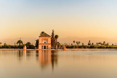 The menara gardens are botanical gardens located to the west of marrakech, morocco, near the atlas.