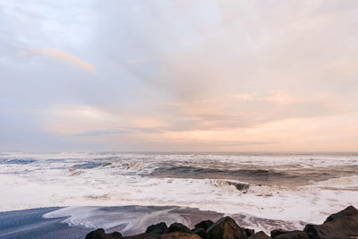 Scenic view of sea against sky during sunset