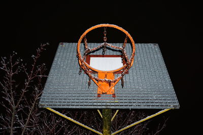 Low angle view of basketball hoop against sky