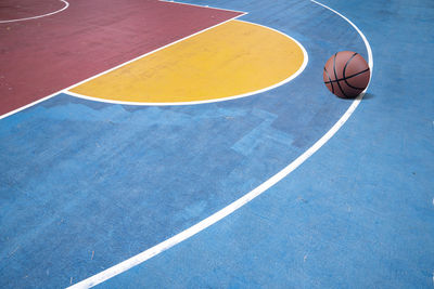 High angle view of basketball on sports court