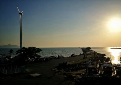 Scenic view of sea against sky at sunset