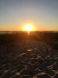 Scenic view of silhouette landscape against clear sky during sunset