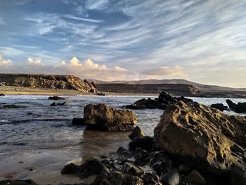 Scenic view of sea against sky during sunset