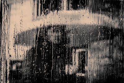 Close-up of water drops on glass