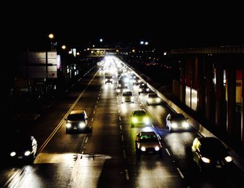 Traffic on road in city at night