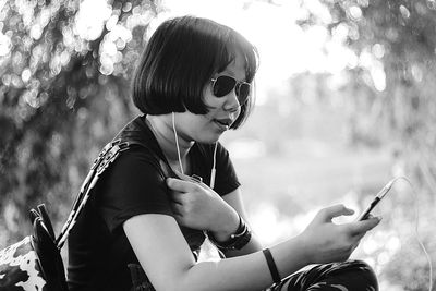 Woman sitting outdoors