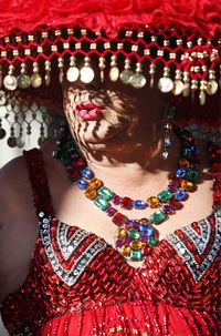 Close-up of red balloons on wall