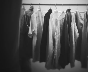 Clothes hanging in rack