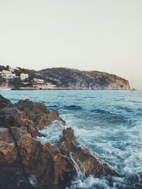 Scenic view of sea against clear sky
